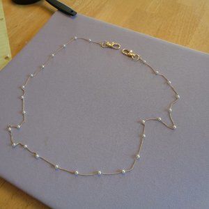 VINTAGE 30 INCHE YELLOW GOLD AND PEARL NECKLACE